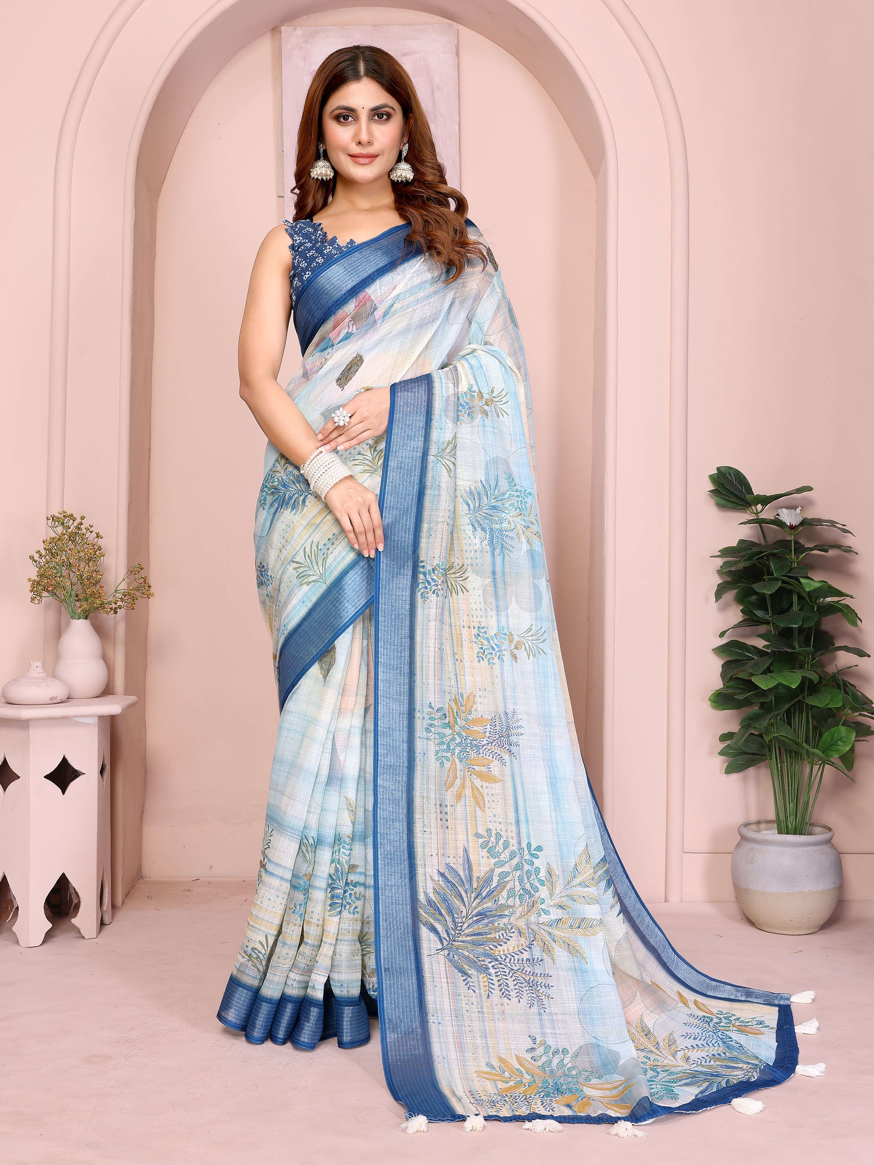 Pastel Blue Linen Cotton Saree with Tropical Leaf Prints & Tassel Pallu