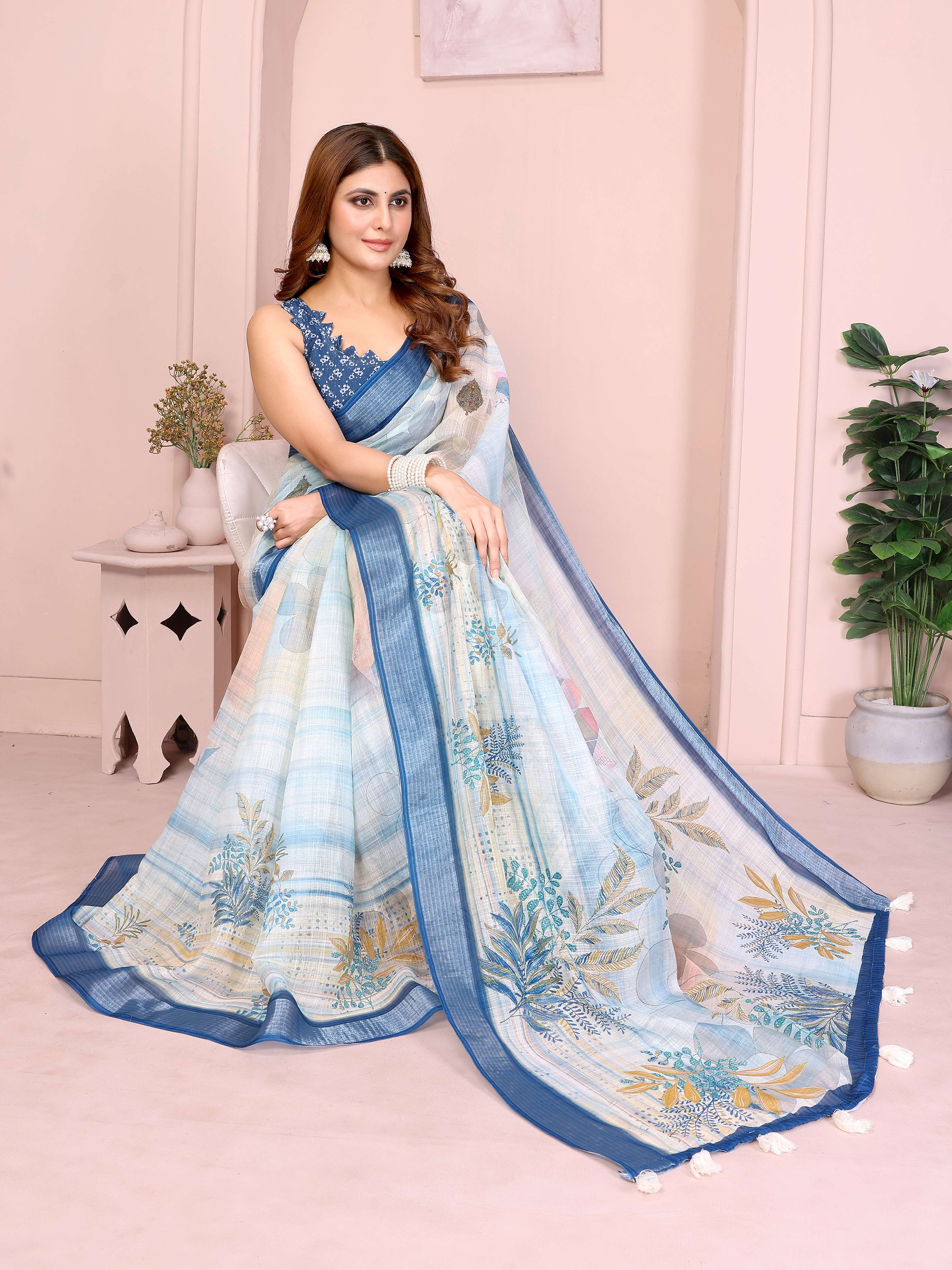 Pastel Blue Linen Cotton Saree with Tropical Leaf Prints & Tassel Pallu
